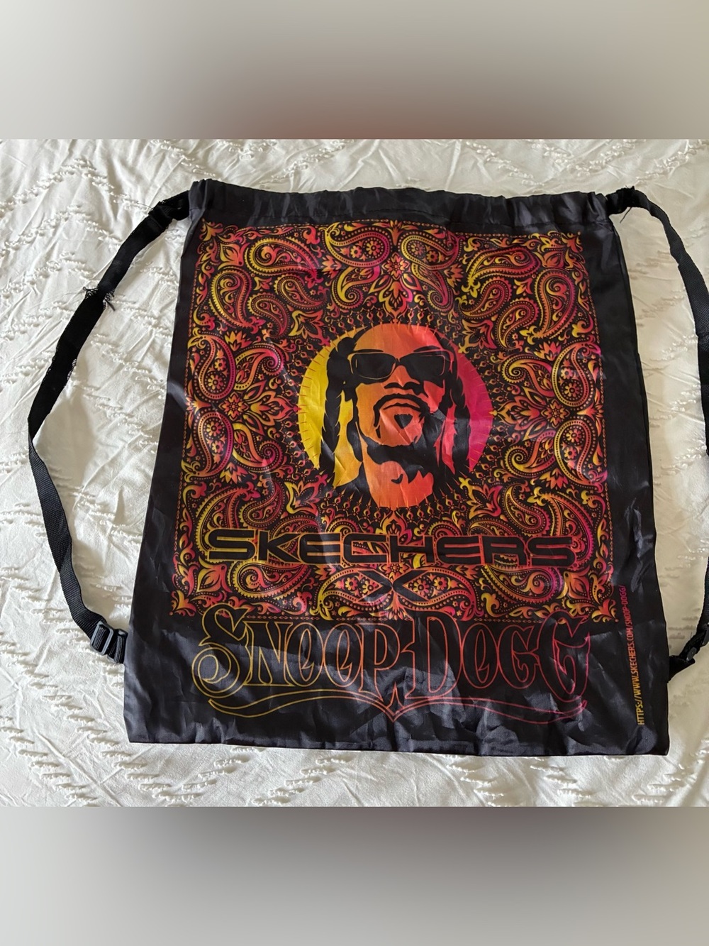 Skechers Black Drawstring Backpack with Red Orange Yellow Graphic